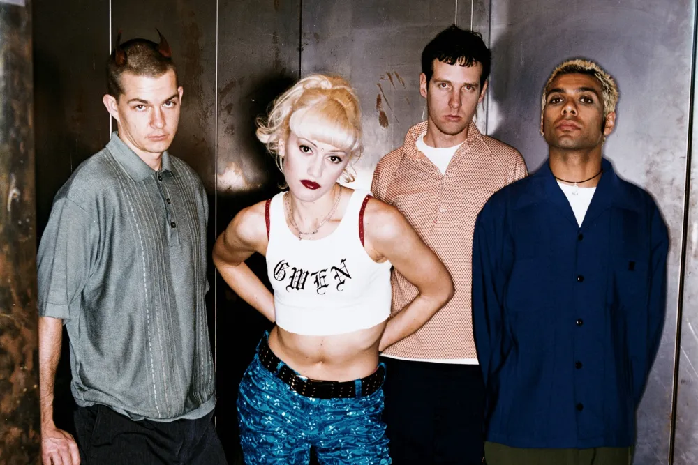 No Doubt band members Gwen Stefani, Tony Kanal, Tom Dumont, and Adrian Young in 1990s promotional photo showcasing iconic ska-punk era style