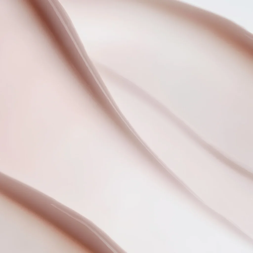 Close-up texture of DUA Skincare Renewer moisturizer cream showing rich, velvety formula for daily hydration