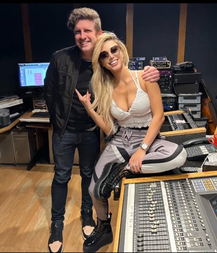 Lika O with Grammy winning vocal producer Robert Eibach in recording studio surrounded by professional audio equipment