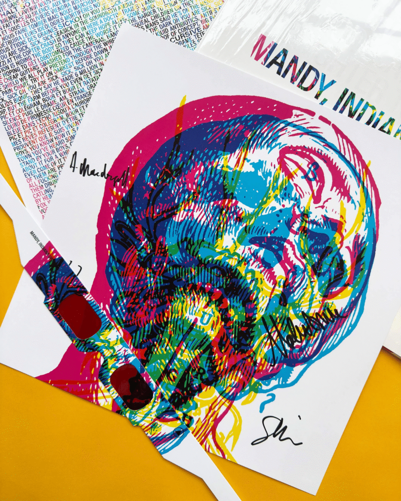 Mandy Indiana URGH album artwork featuring vibrant multicolored skull illustration in pink blue yellow and green on white vinyl record sleeve