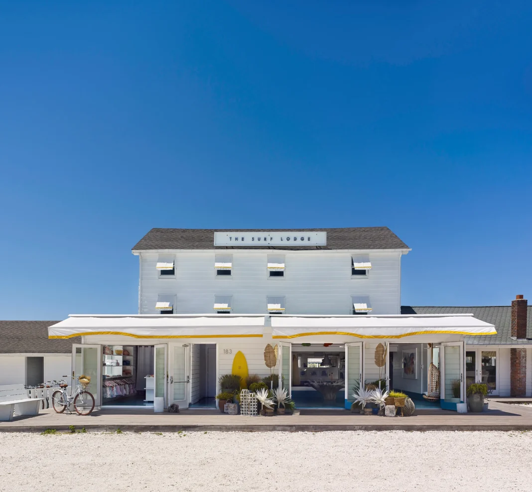 The Surf Lodge beachfront hotel in Montauk under a clear blue sky.