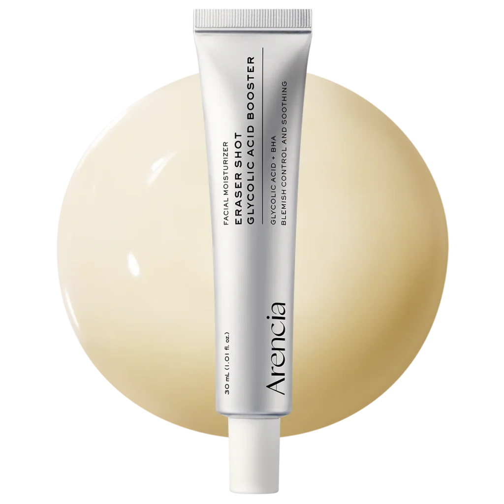 Arencia Eraser Shot Glycolic Acid Booster in a silver tube against a round pale yellow serum swatch