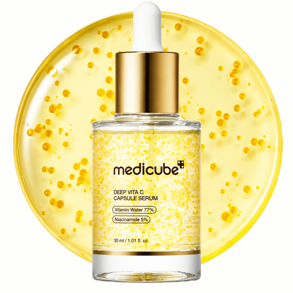 Medicube-Deep-Vita-C-Capsule-Serum-30ml-bottle-with-visible-vitamin-C-capsules-and-gold-dropper