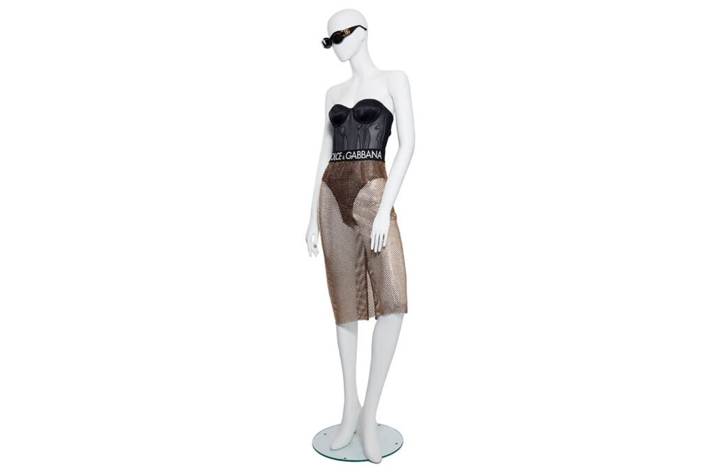 Black-Dolce-Gabbana-logo-bustier-with-a-sheer-mesh-skirt-and-sunglasses-from-The-Devil-Wears-Prada
