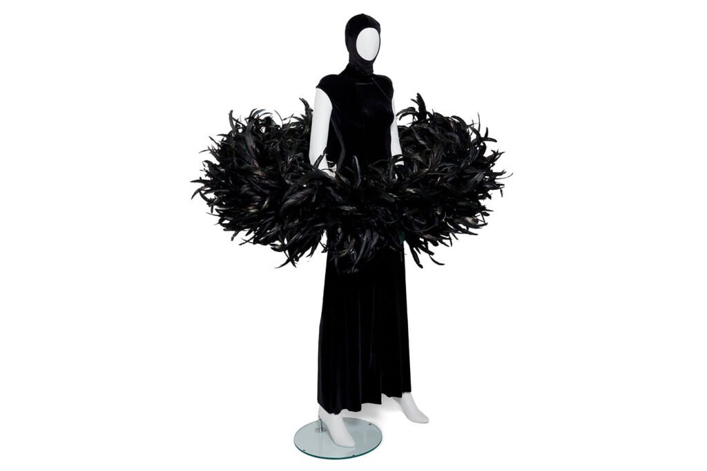 Black-velvet-hooded-gown-with-a-dramatic-feathered-hip-detail-from-The-Devil-Wears-Prada-2