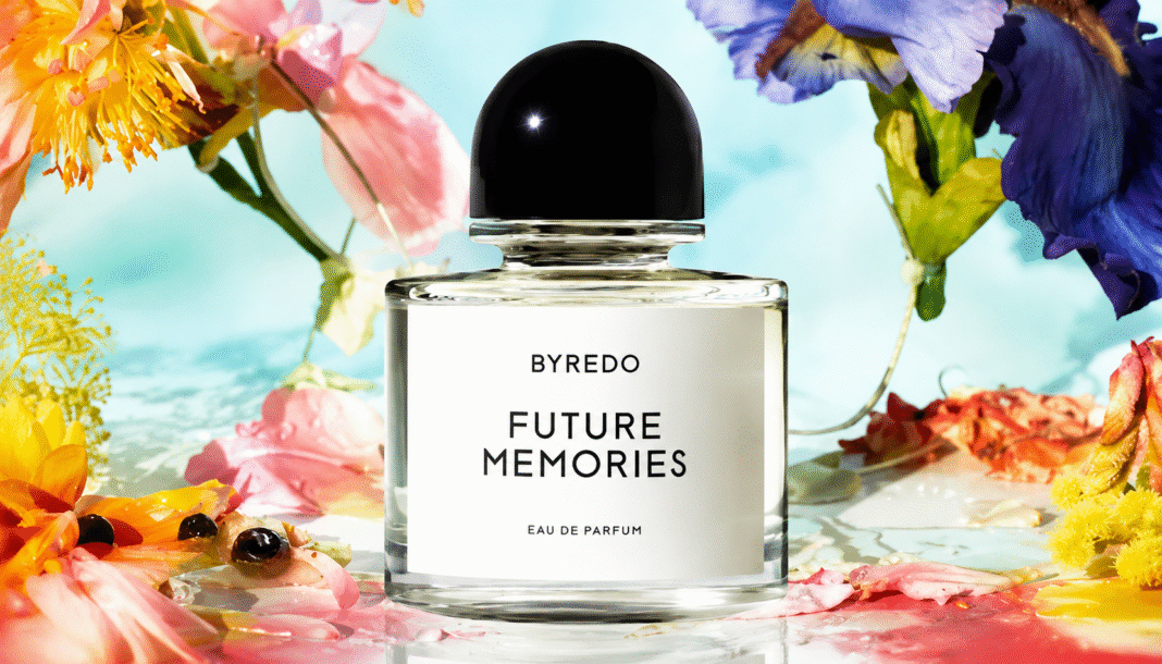 Byredo Future Memories Eau de Parfum bottle set among fresh iris, petals, and blackcurrant berries.